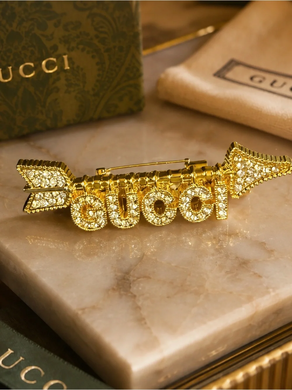 Gold Brooch and GG Designed Socks